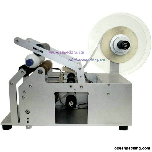 <b>OPLM-R semi automatic round bottle labeling machine</b>